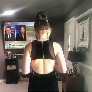 Black velvet gown with black sheer inserts. Mermaid style